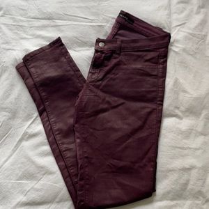 Coated wax maroon J brand skinny jeans